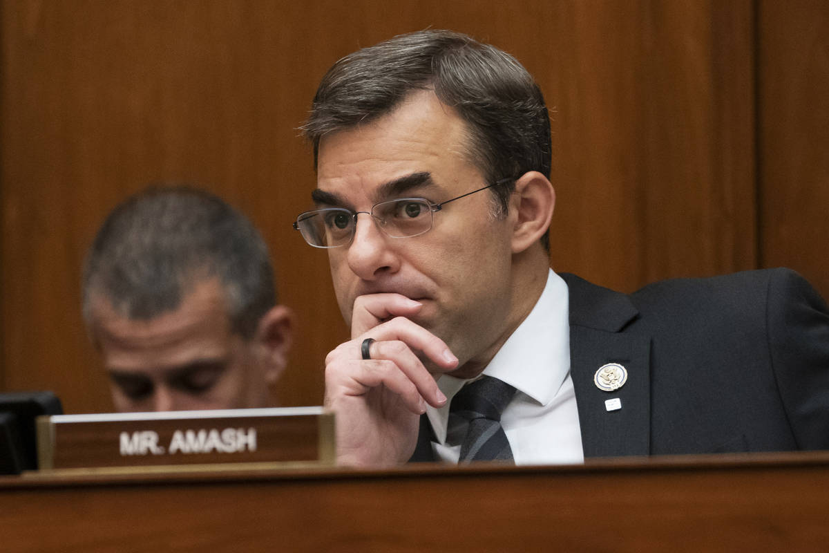 In this June 12, 2019, file photo, Rep. Justin Amash, R-Mich., listens to debate on Capitol Hil ...