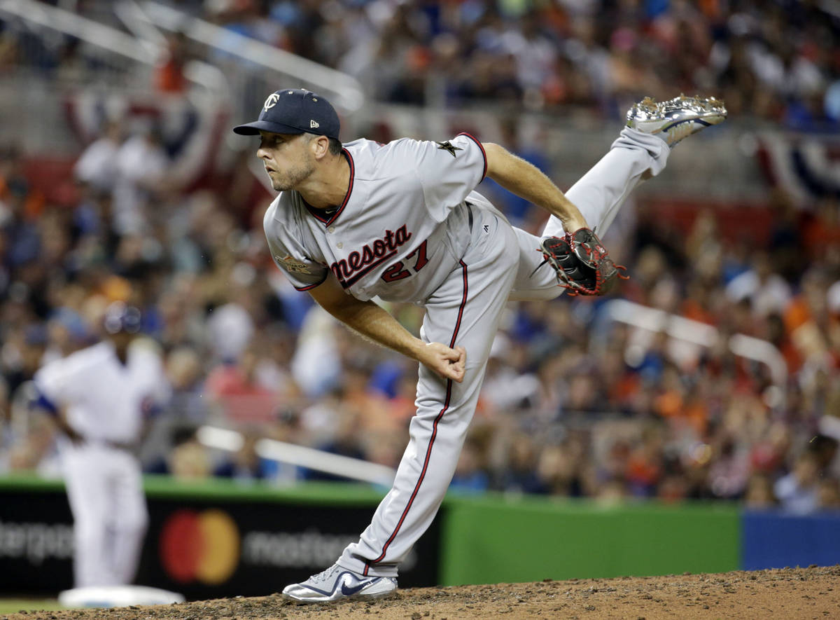 American League Minnesota Twins pitcher Brandon Kintzler (27), delivers a pitch, in the fifth i ...