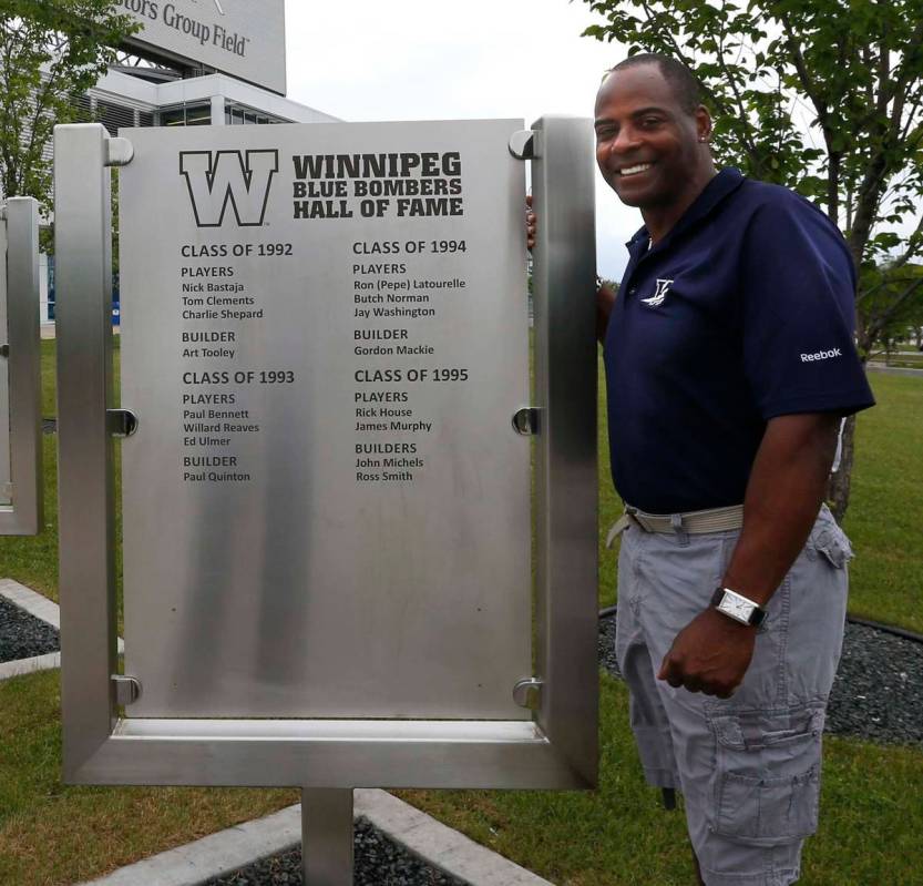 Willard Reaves, former star running back for the Winnipeg Blue Bombers, stands by the new Blue ...