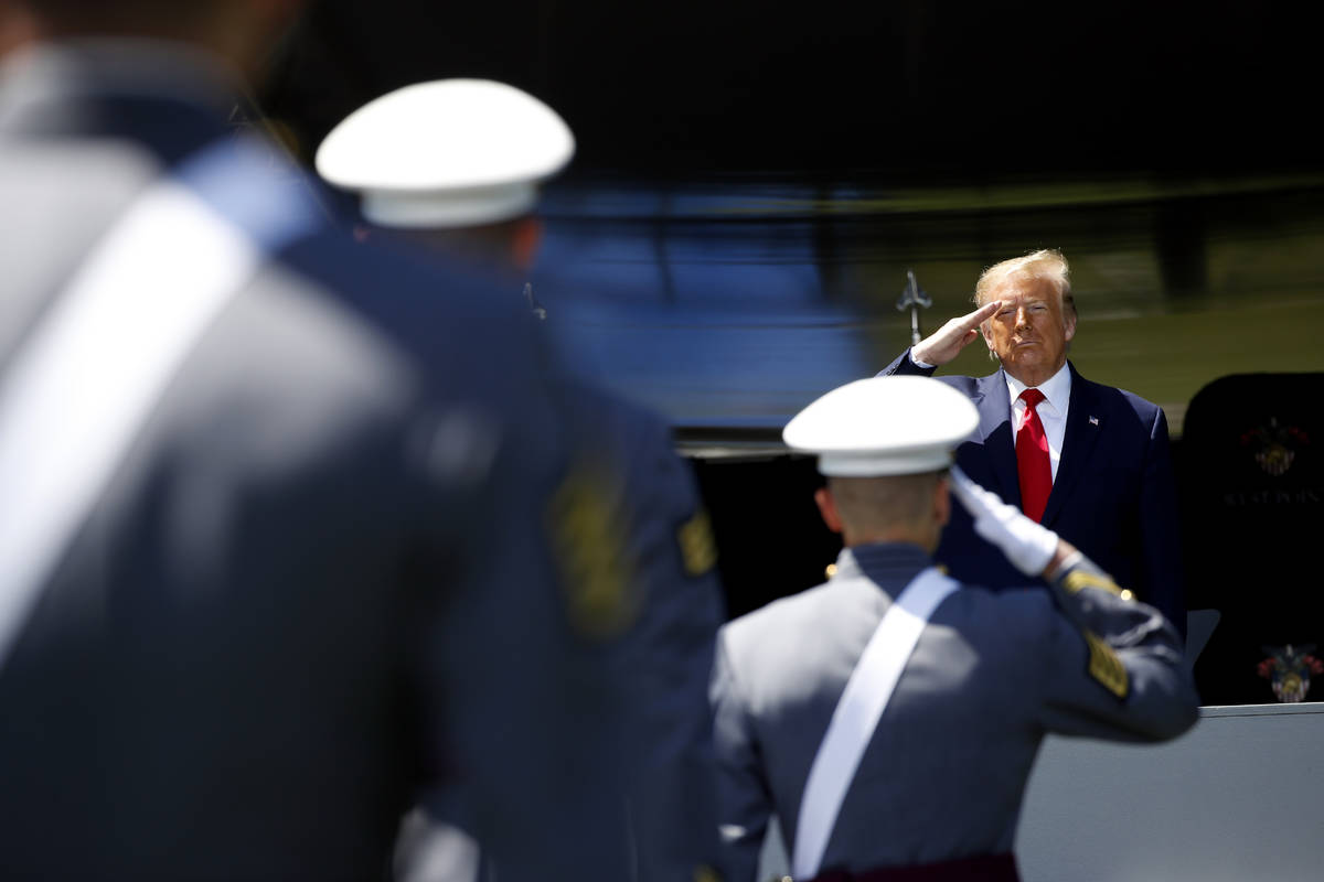 President Donald Trump salutes after speaking to over 1,110 cadets in the Class of 2020 at a co ...