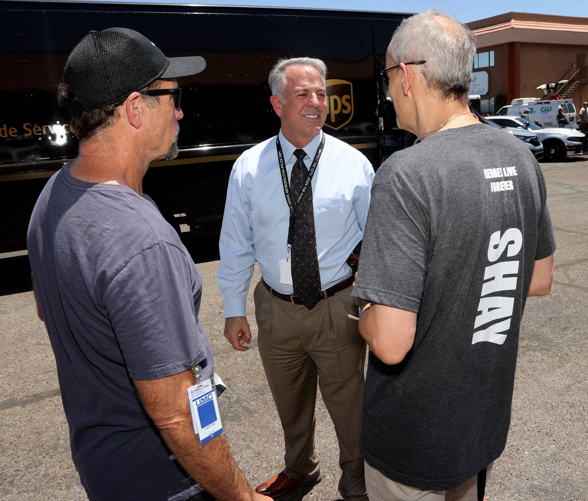 Frank Mikalonis, uncle of Las Vegas police officer Shay Mikalonis, right, and Shay's stepfather ...