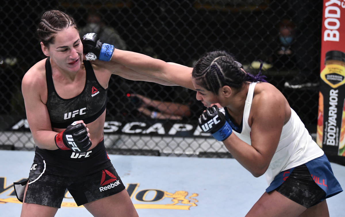 LAS VEGAS, NEVADA - JUNE 13: (R-L) Cynthia Calvillo punches Jessica Eye in their flyweight figh ...