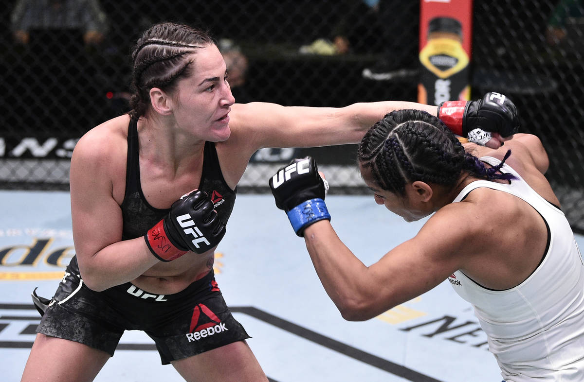 LAS VEGAS, NEVADA - JUNE 13: (L-R) Jessica Eye punches Cynthia Calvillo in their flyweight figh ...