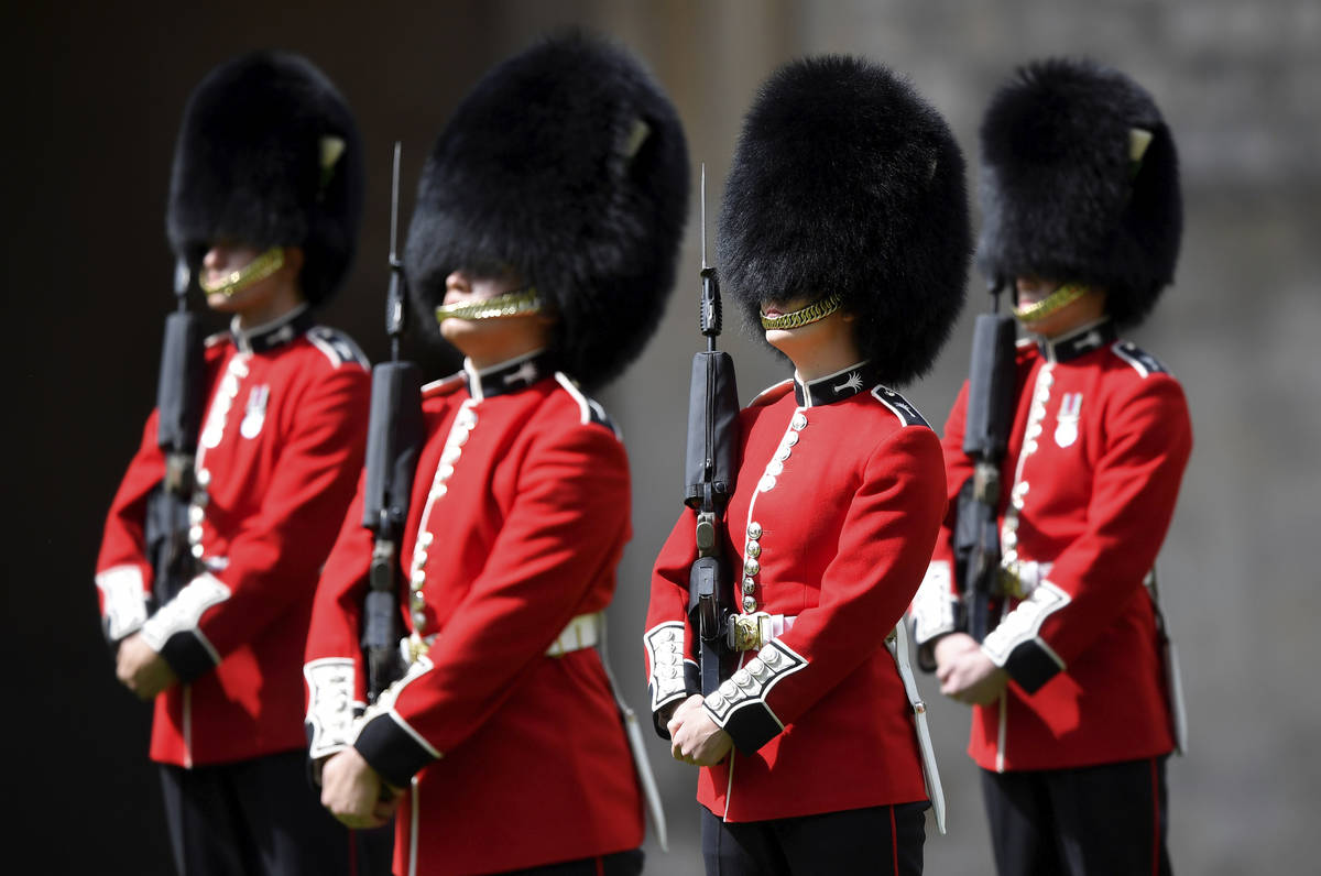 Members of the Welsh Guards perform in a ceremony to mark the official birthday of Britain's Qu ...