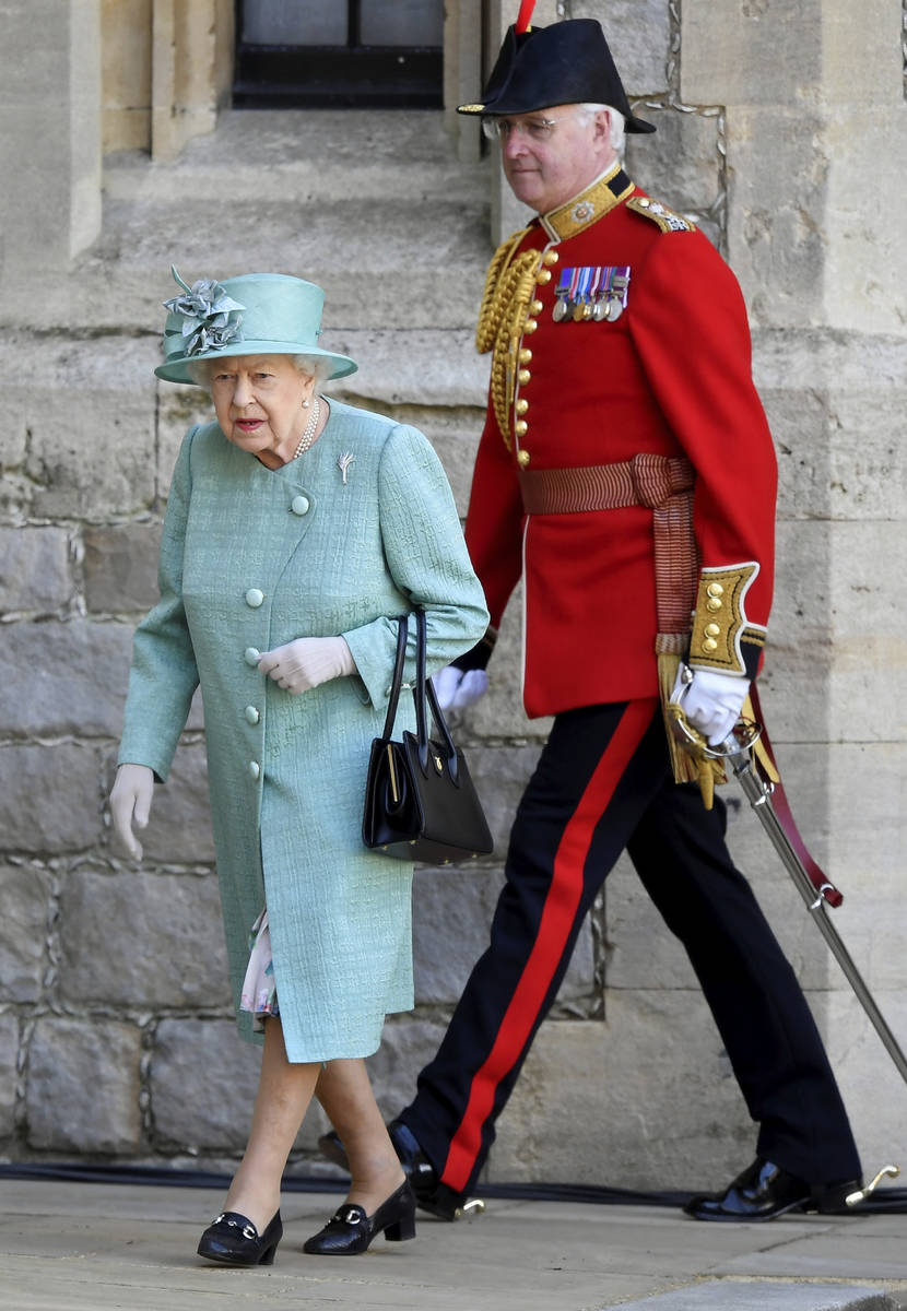 Britain's Queen Elizabeth II attends a ceremony to mark her official birthday at Windsor Castle ...
