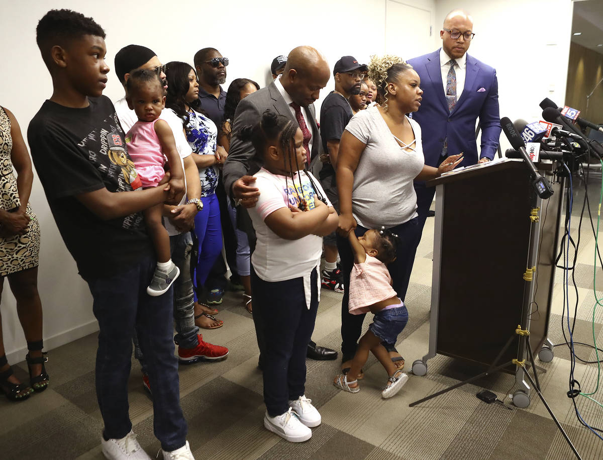 Tomika Miller, the wife of Rayshard Brooks, speaks in his memory with their children by her sid ...