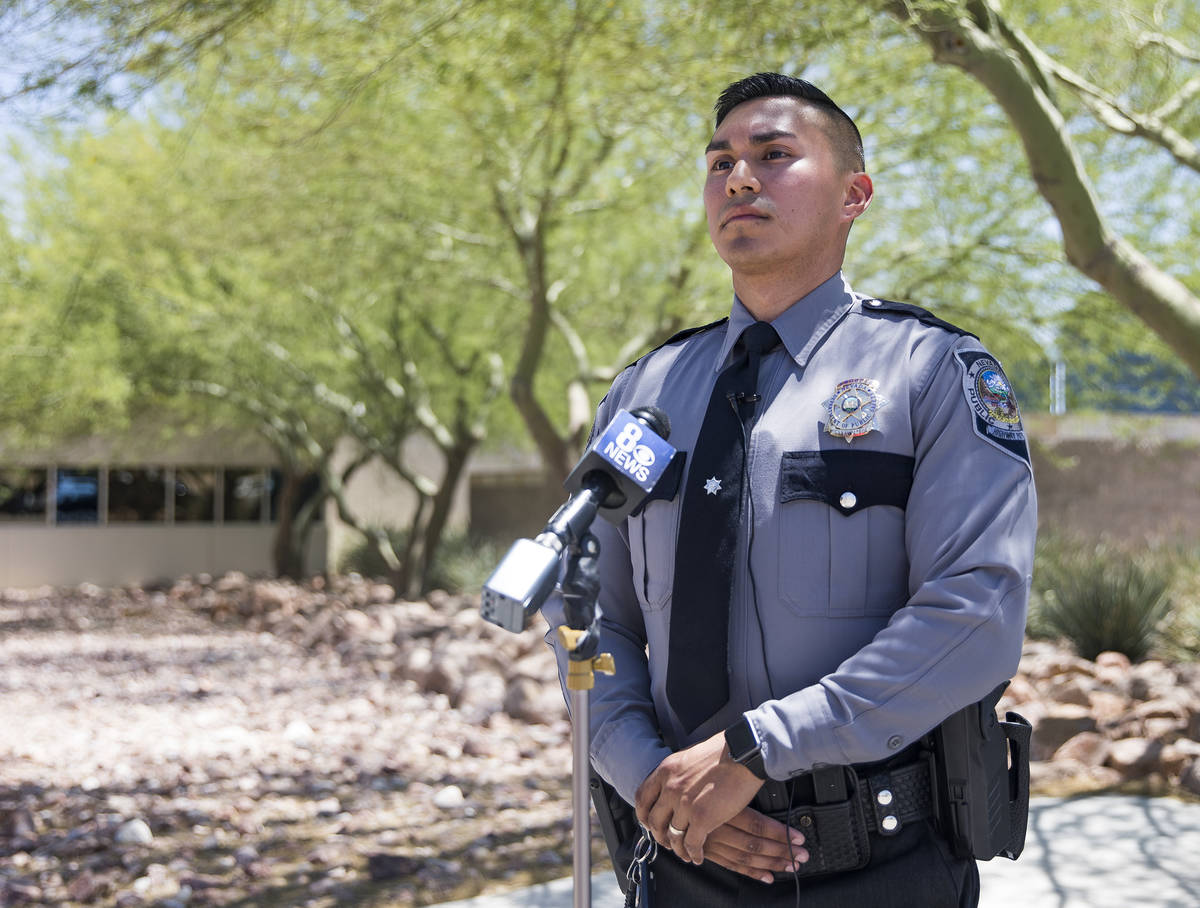 Nevada Highway Patrol Trooper Rafael Rodriguez speaks to the media about how he saved a woman w ...