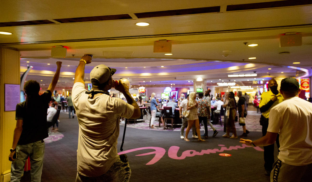 Protesters chant "Black Lives Matter" into Flamingo during a Black Lives Matter march ...