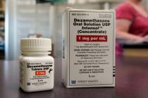 Packages of Dexamethasone are displayed in a pharmacy, Tuesday, June 16, 2020, in Omaha, Neb. ...