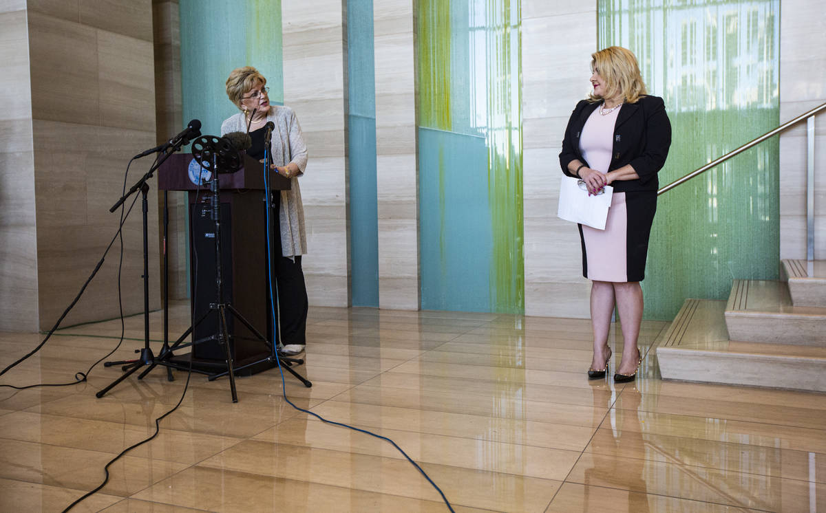 Las Vegas Mayor Carolyn Goodman, left, speaks after Las Vegas City Councilwoman Michele Fiore a ...