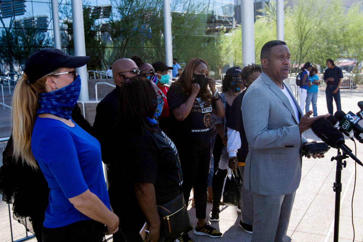 Michael Baisden, a radio personality, speaks at an NAACP protest on Wednesday, June 17, 2020, i ...