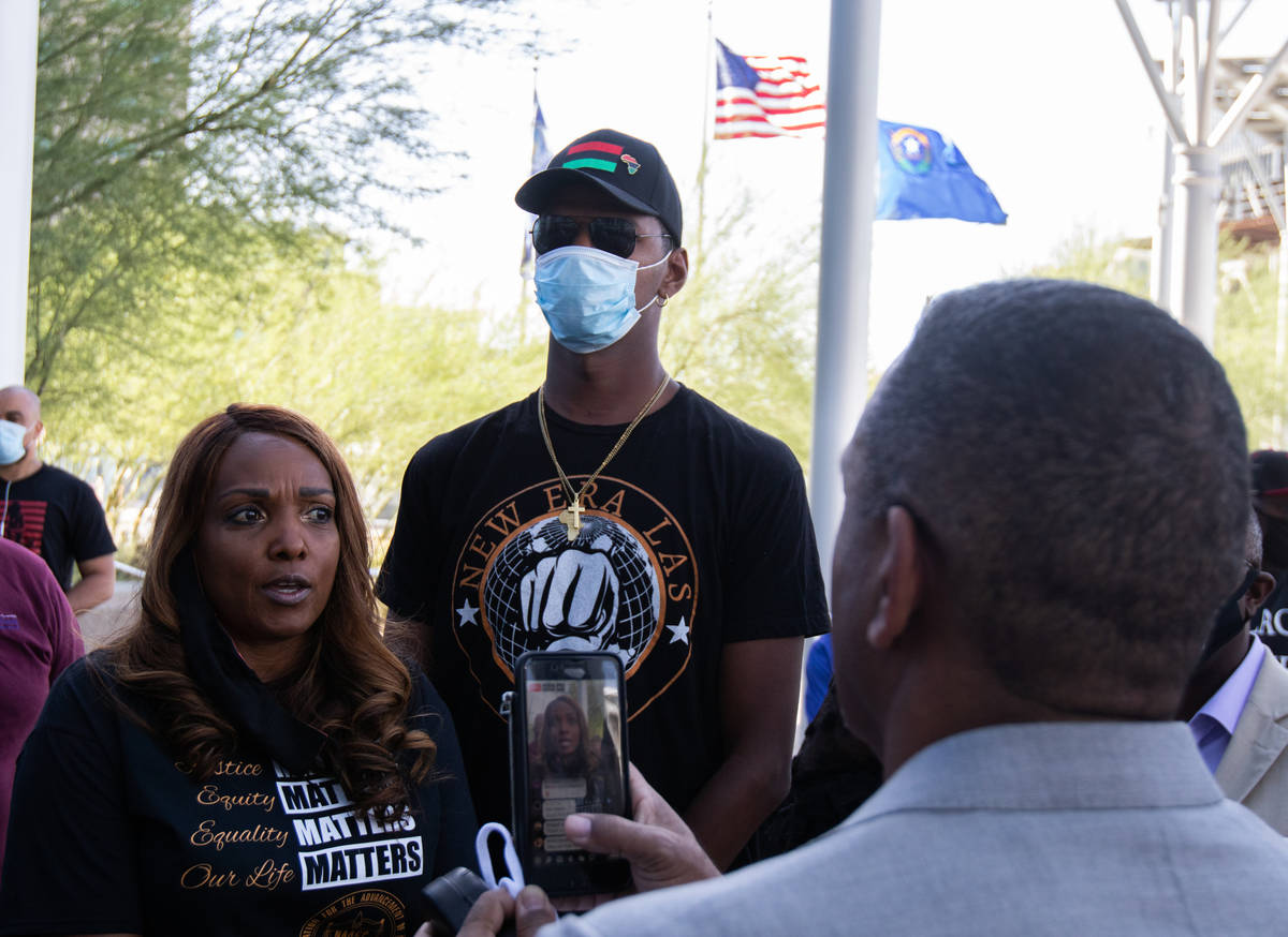 Roxann McCoy, president of the NAACP Las Vegas branch, speaks at an NAACP protest while standin ...
