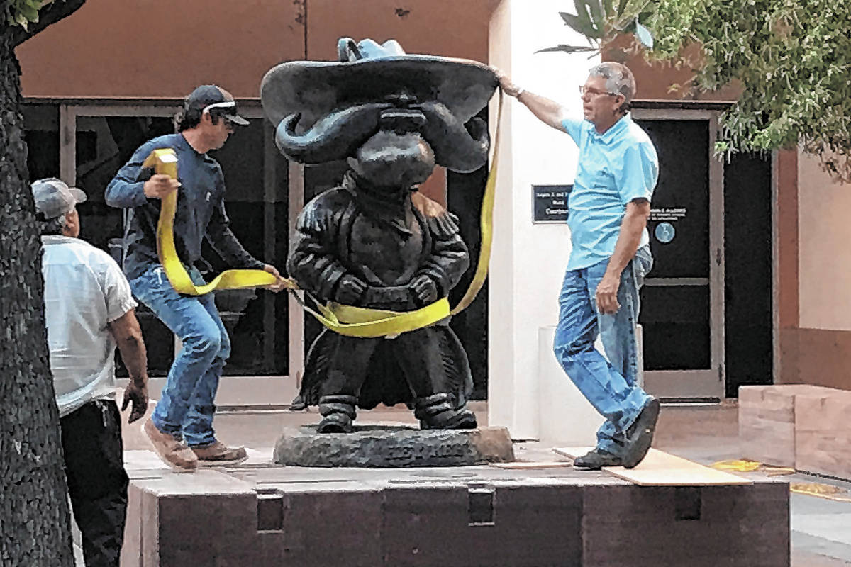 UNLV works to remove the Hey Reb! statue from in front of the Tam Alumni Center on Tuesday, Jun ...