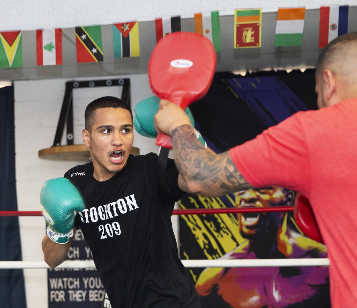 Gabe Flores Jr., left, works out at Capetillo & TM Boxing on Saturday, June 13, 2020, in La ...