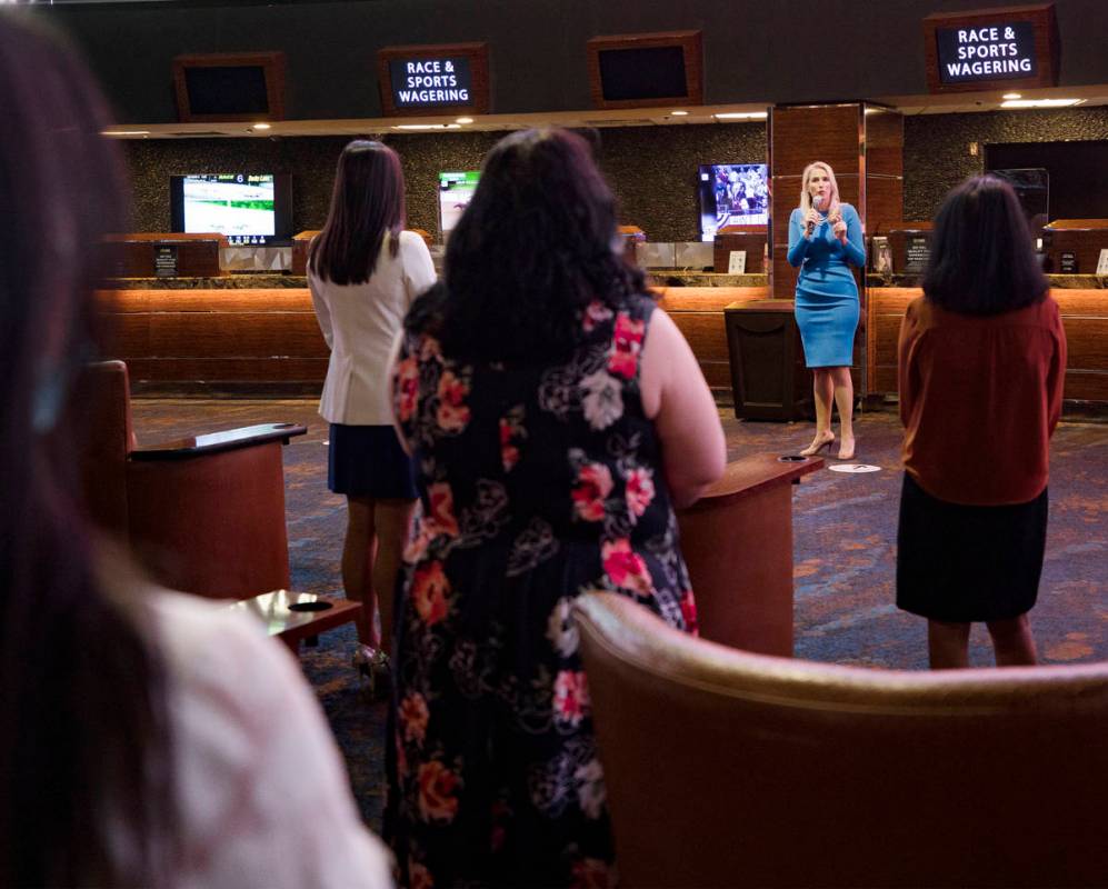 Cami Christensen, general manager and president of Westgate Las Vegas, addresses employees befo ...