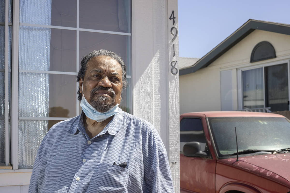 Paul Wise, a former resident of the Alpine Motel, poses for a portrait outside his new residenc ...