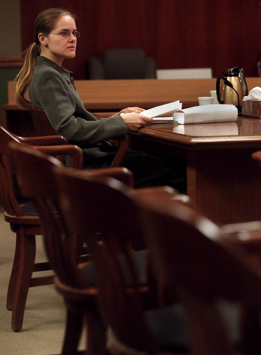 Jessica Williams waits alone as all of the attorneys were in a closed door hearing with Judge G ...