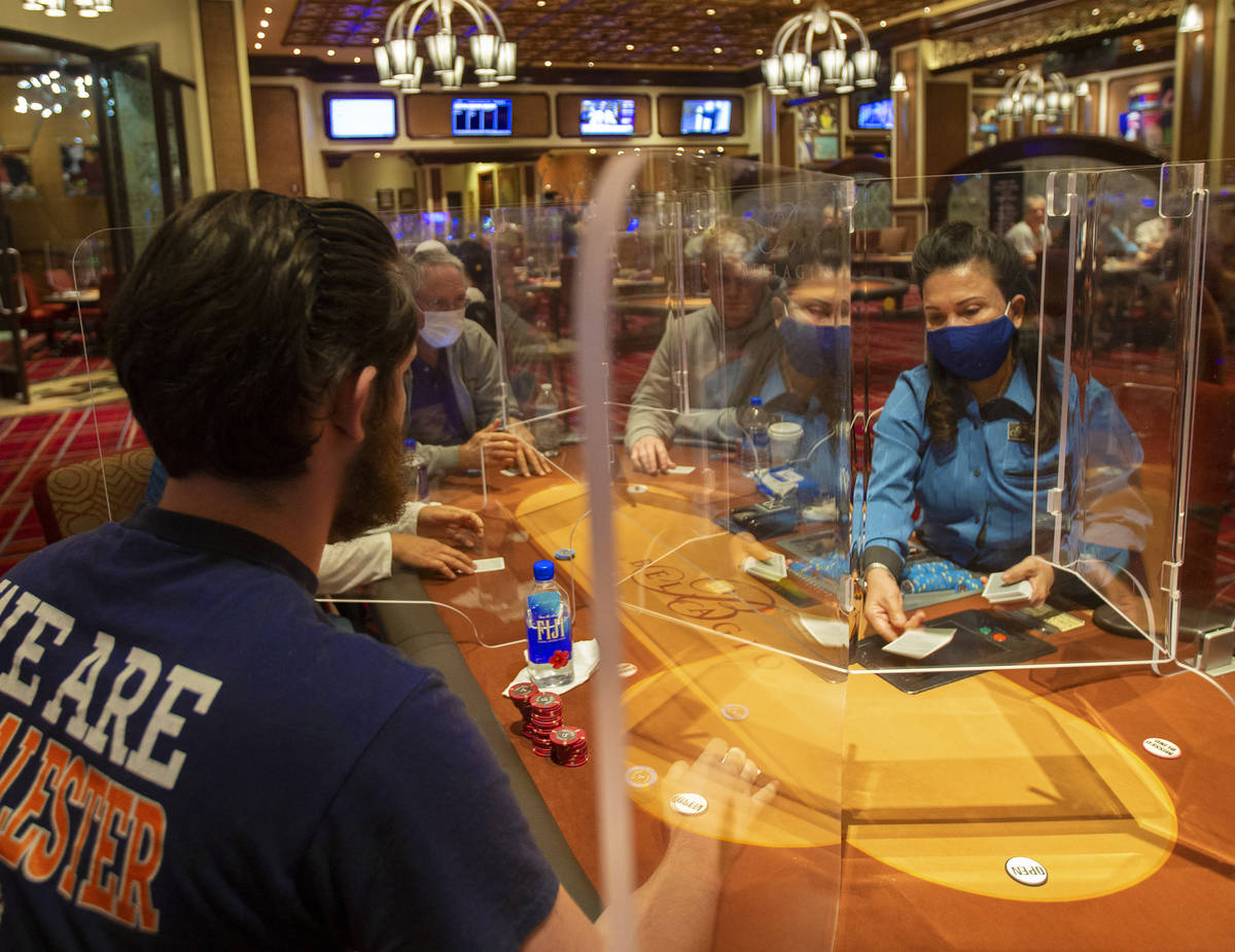 The Bellagio poker room is packed after being outfitted with shielding and upgraded sanitation ...