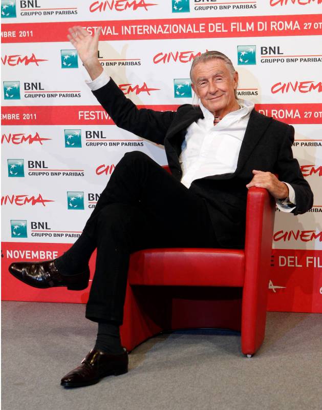 FILE - In this Nov. 3, 2011 file photo, director Joel Schumacher waves during a photo call for ...