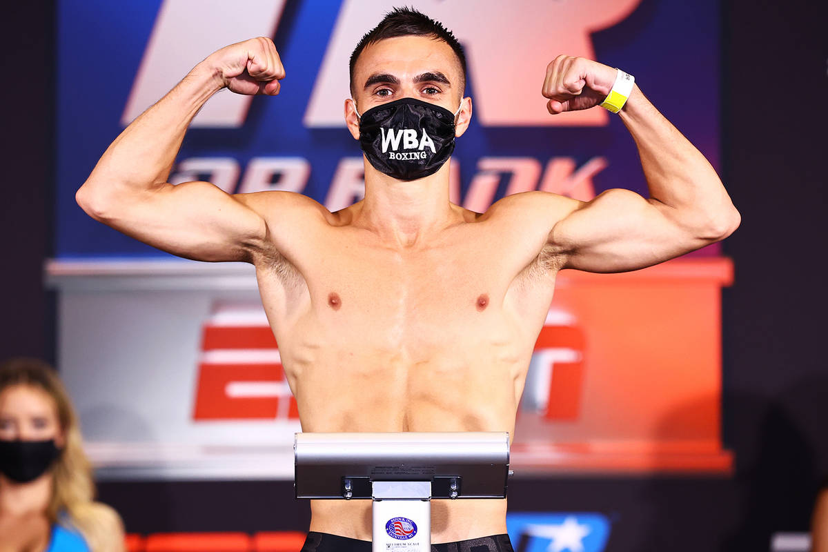 WBA super flyweight champion Andrew Moloney of Australia weighs in Monday on his title fight Tu ...