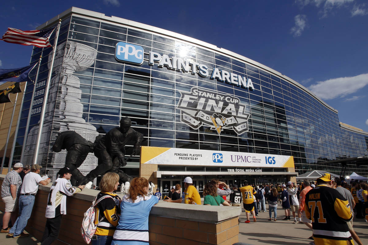 Fans wait outside PPG Paints Arena for Game 1 of the NHL hockey Stanley Cup Finals between the ...