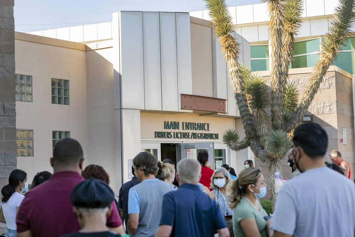People wait in line at the Nevada Department of Motor Vehicles at 8250 West Flamingo Road, Las ...