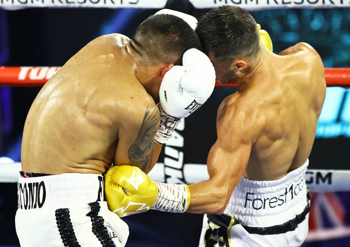 Joshua Franco, left, and Andrew Moloney trade punches Tuesday, June 23, 2020, at the MGM Grand ...