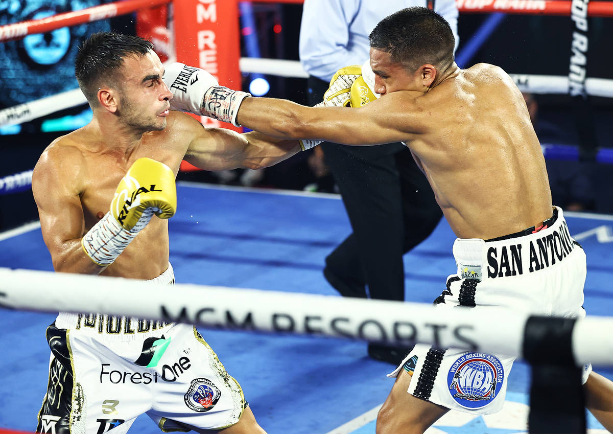Andrew Moloney, left, and Joshua Franco trade punches Tuesday, June 23, 2020, at the MGM Grand ...