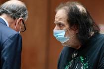 Adult film star Ron Jeremy, right, makes his first appearance in downtown Los Angeles Criminal ...
