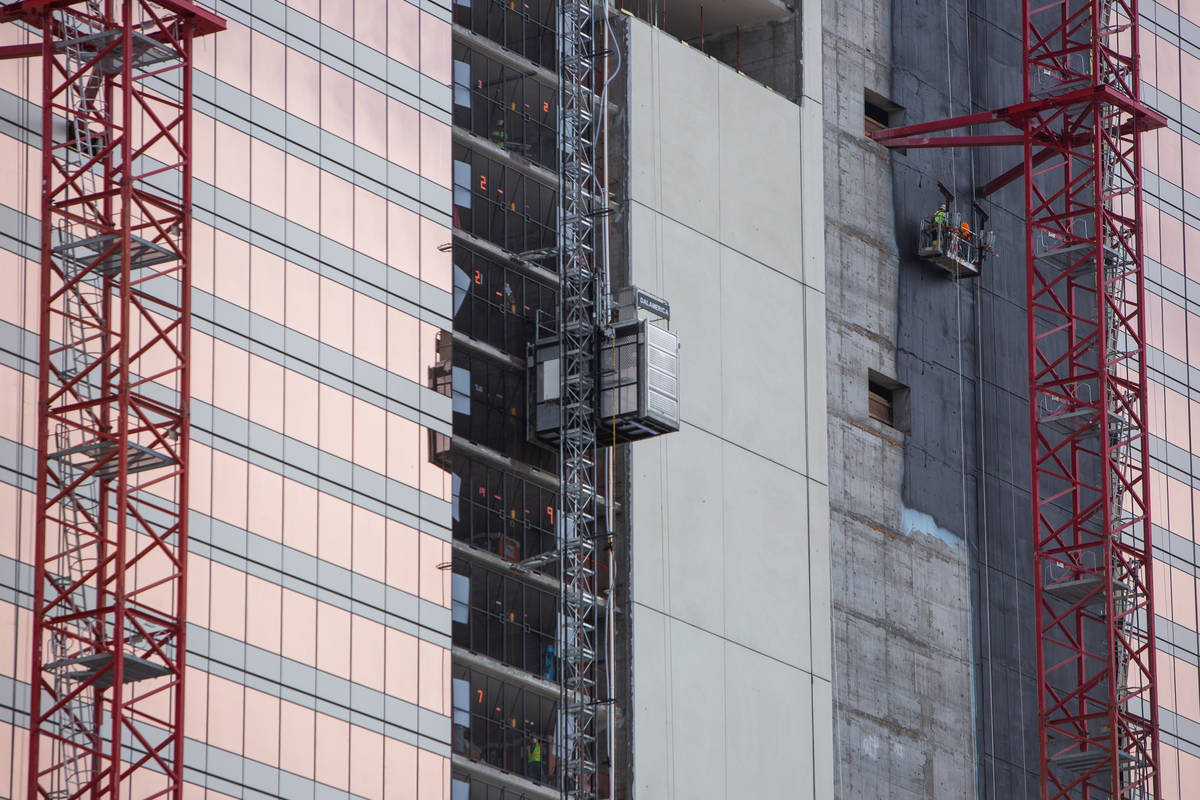 Construction workers descend from the Circa construction site in Las Vegas on Wednesday, June 2 ...