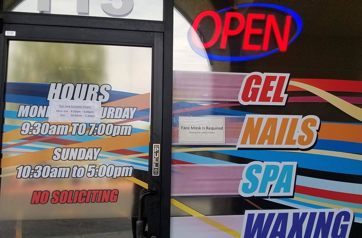 A sign warns patrons not to enter a store at Southwest Marketplace, off Rainbow Boulevard betwe ...