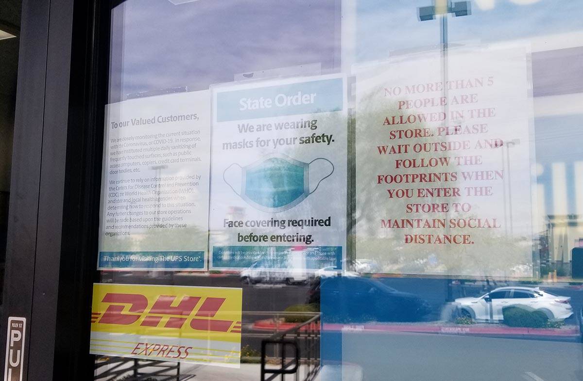 A sign warns patrons not to enter a store at Southwest Marketplace, off Rainbow Boulevard betwe ...