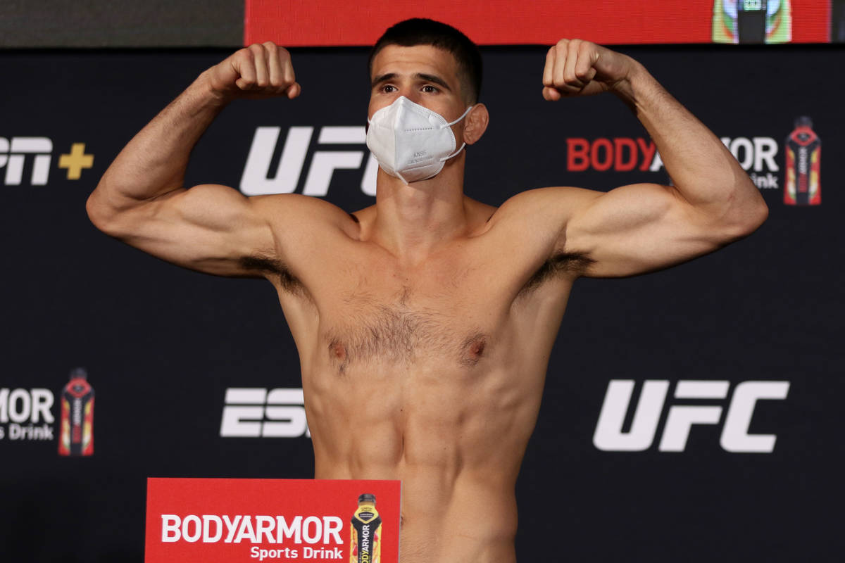 UFC welterweight Mickey Gall poses on the scale at the UFC Apex during weigh-ins for UFC on ESP ...