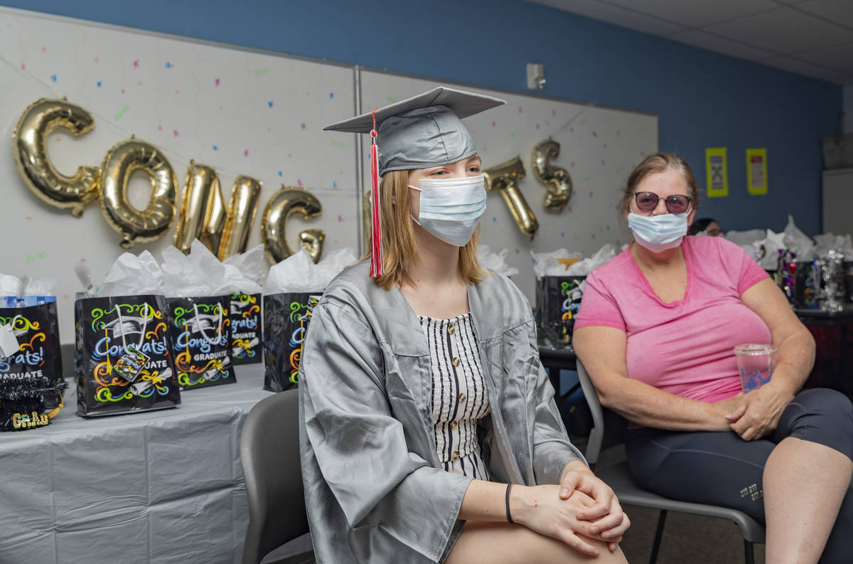 Arbor View High School graduate Joselyn Smith, left, and her foster parent Tami Soudbakhsh chat ...