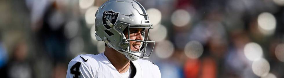 Oakland Raiders quarterback Derek Carr in action during the first half of an NFL football game ...
