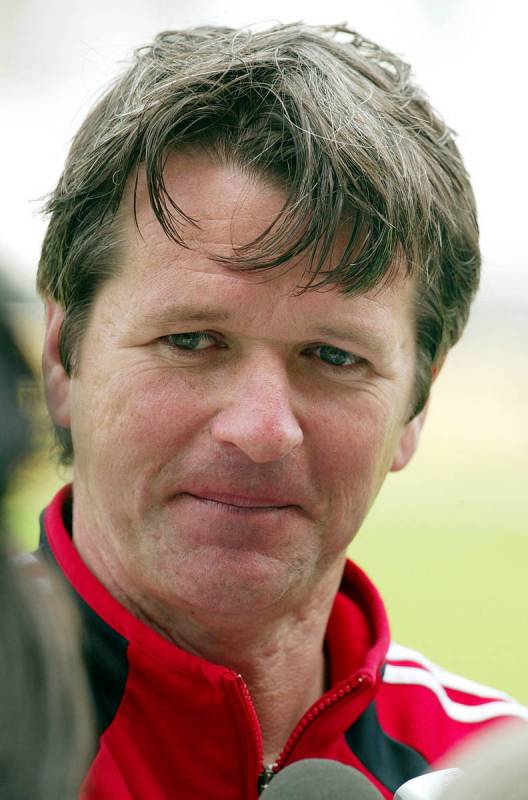 Canada's national soccer team coach Frank Yallop talks to journalists after a training session ...