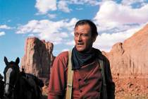 FILE*** In this photo released by Warner Bros., actor John Wayne plays Ethan Edwards in the new ...