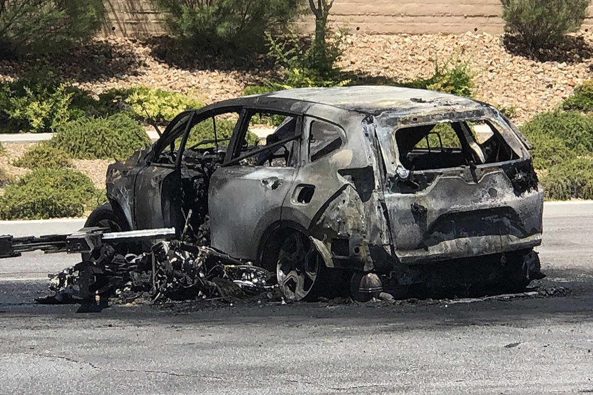 Police investigate a fiery crash involving a motorcycle and SUV on Sunday, June 28, 2020, on De ...