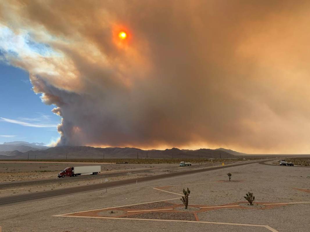 Smoke is seen from Snow Mountain overpass and U.S. Highway 95 North on Sunday, June 28, 2020, i ...