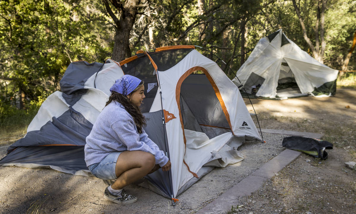 Isabel Nava, 17, and her family pack up their camping gear just to be safe as they leave the Fl ...