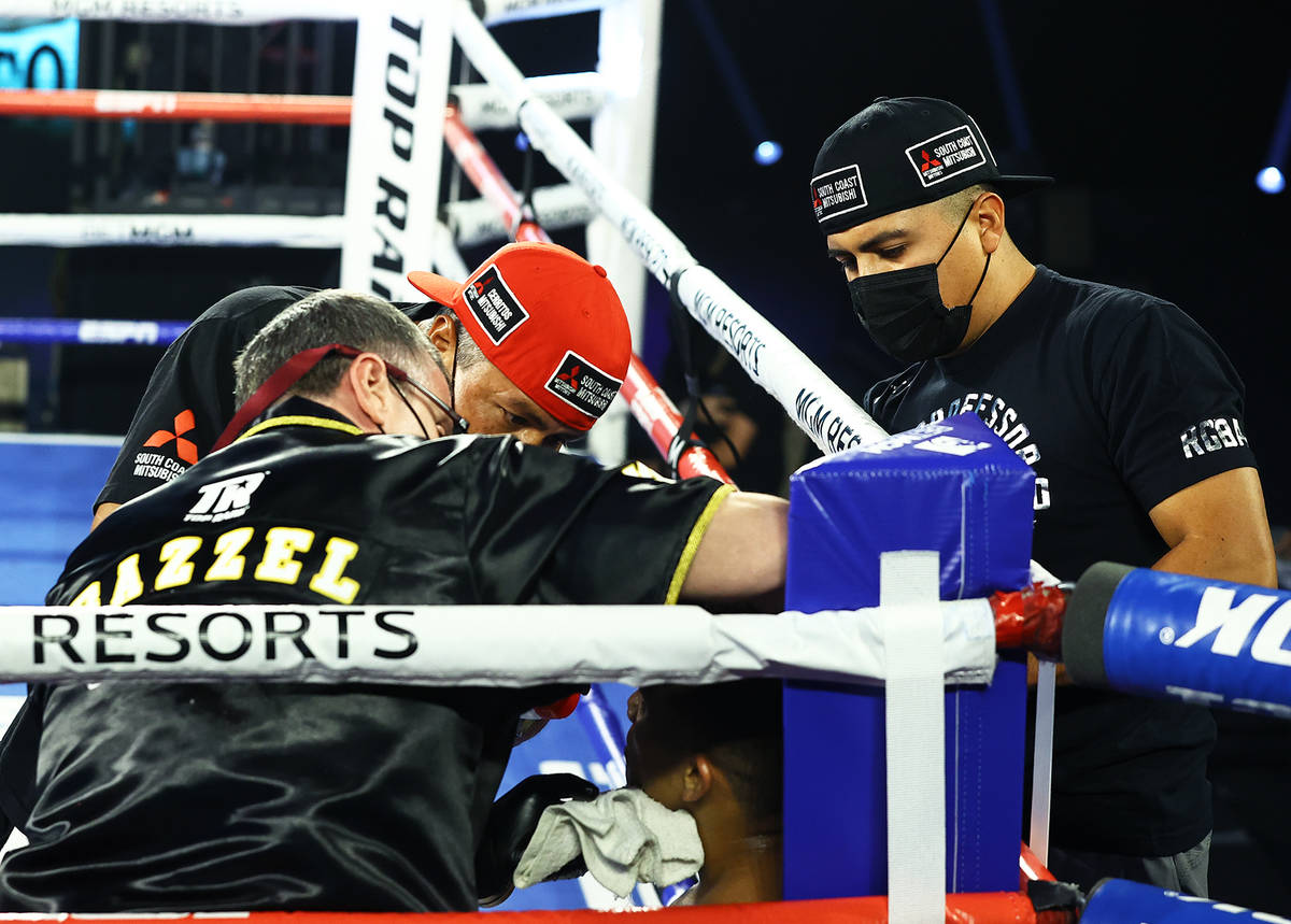 Boxer Joshua Franco is attended to by his cornermen between rounds during a recent Top Rank car ...