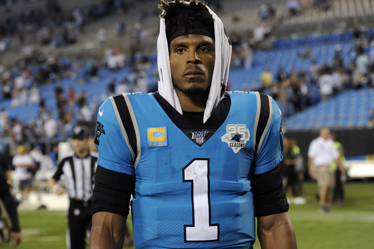 In this Sept. 13, 2019, file photo, Carolina Panthers quarterback Cam Newton (1) walks off the ...
