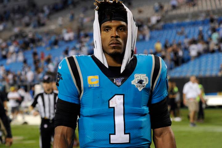 In this Sept. 13, 2019, file photo, Carolina Panthers quarterback Cam Newton (1) walks off the ...