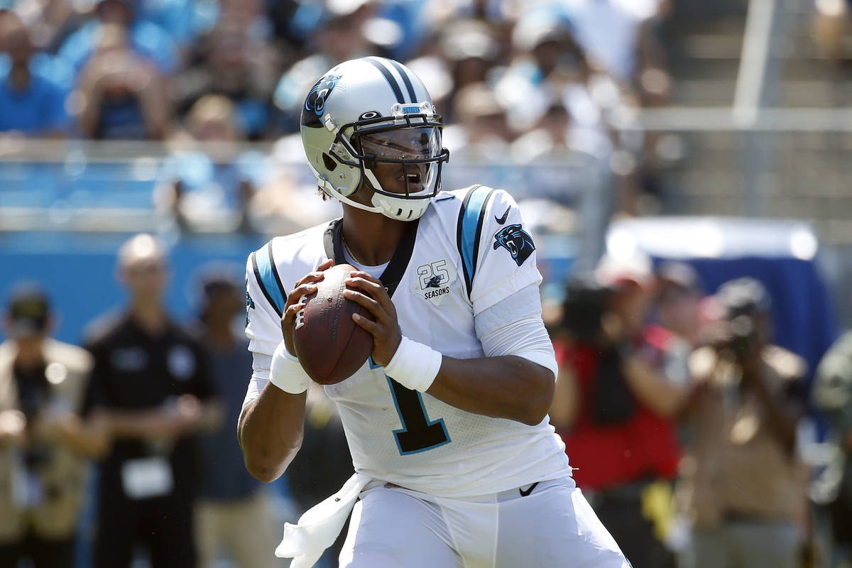 Carolina Panthers quarterback Cam Newton (1) looks to pass against the Los Angeles Rams during ...