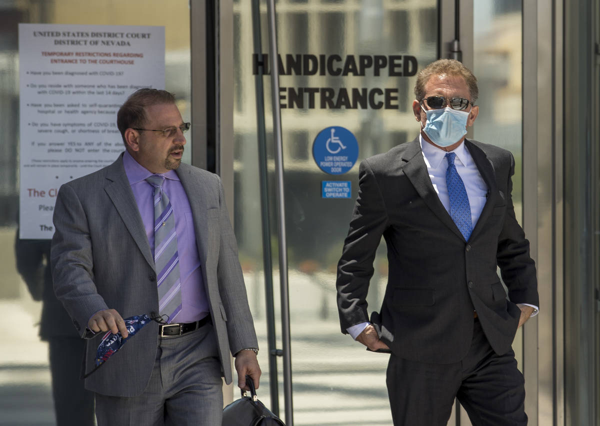 Attorney Marc Victor, left, walks outside with his client Douglas Haig after Haig's sentencing ...