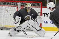 Golden Knights goalie Jiri Patera keeps his eye on the puck during Knights rookie camp practice ...