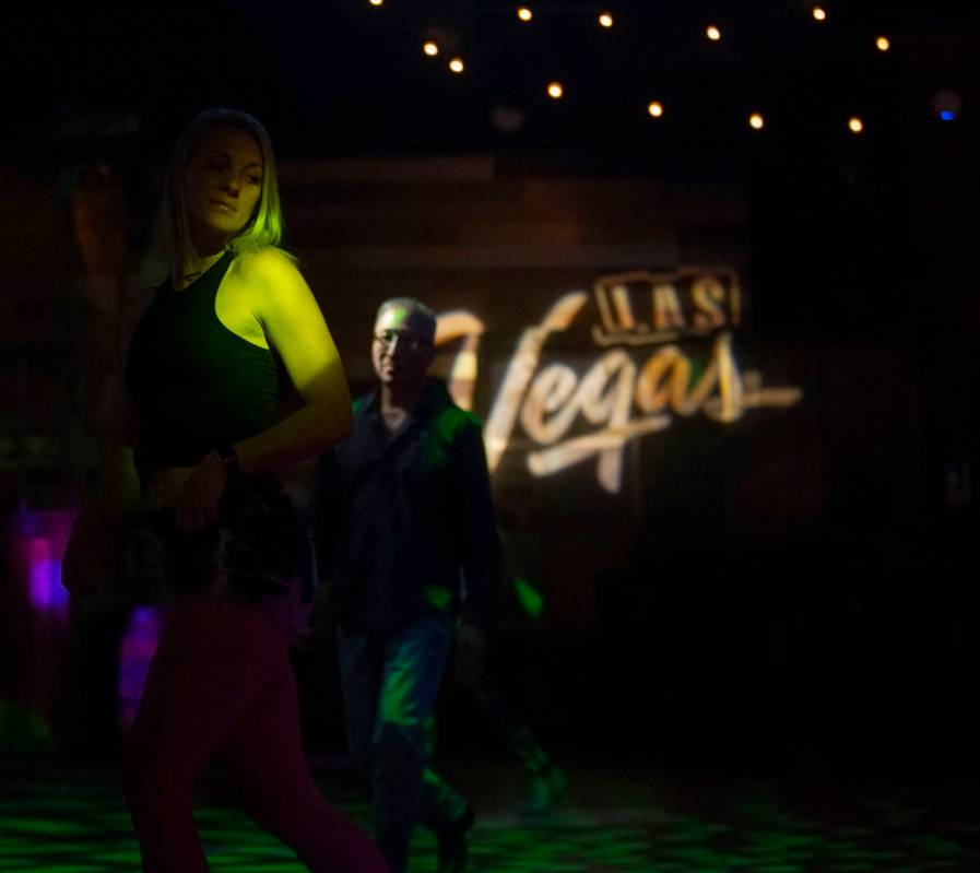 Patrons dance at Stoney's Rockin' Country while adhering to social distancing standards on Frid ...