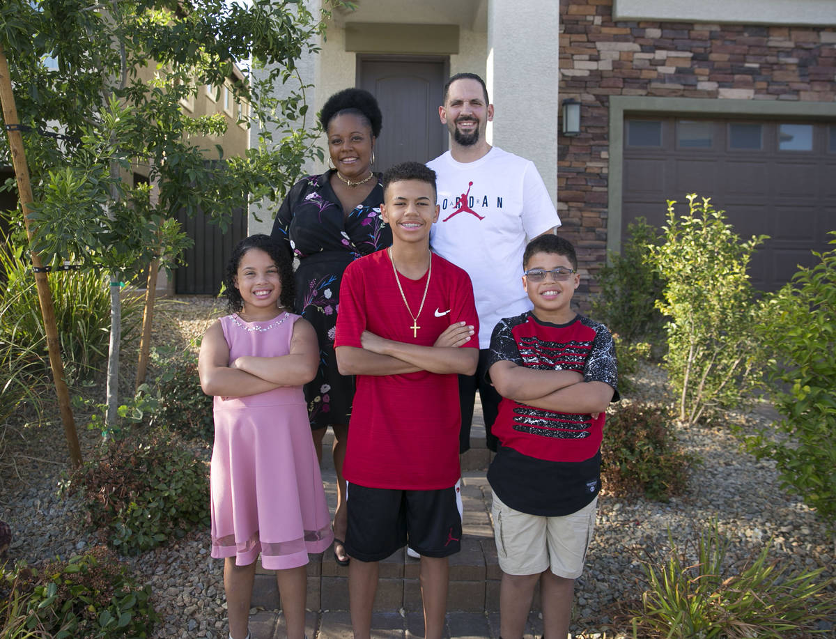 Tyvasha Celano, left, her husband Mike and their children, Kya, 10, Joey, 13, and Alac, 10, in ...