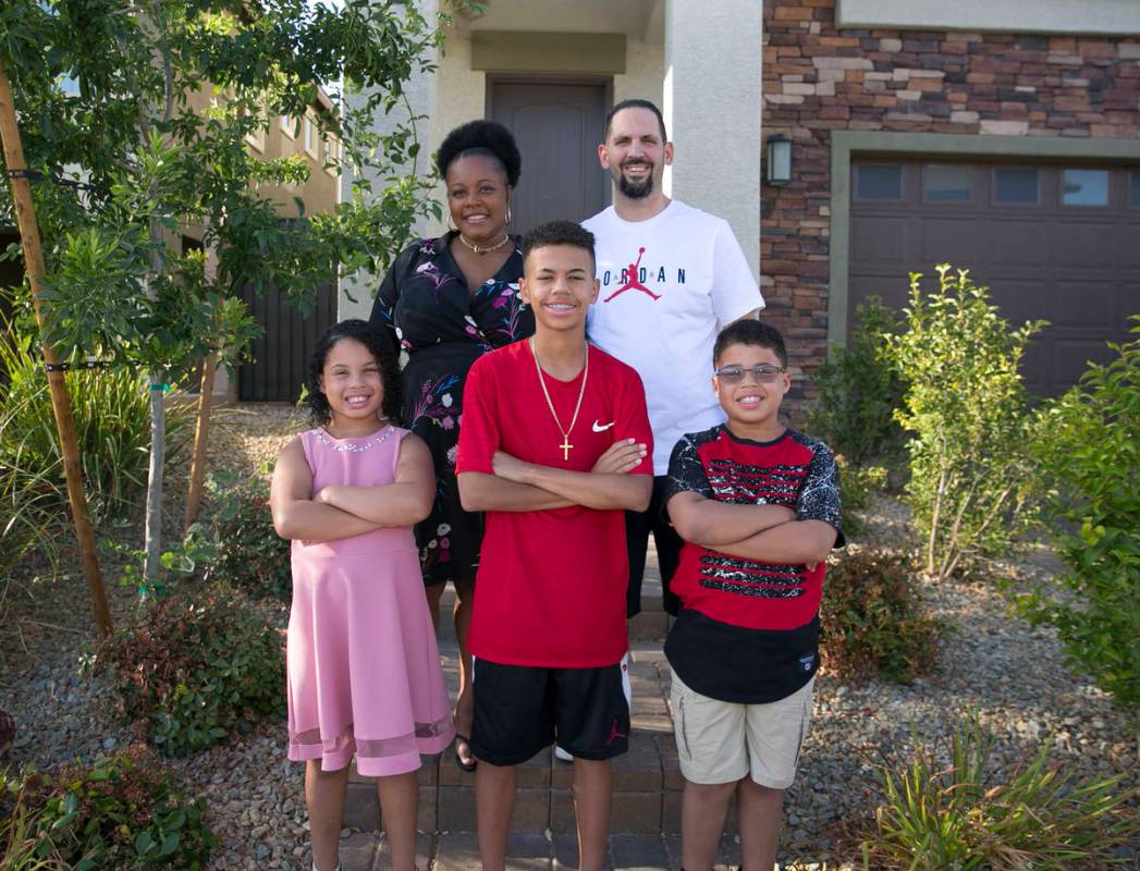 Tyvasha Celano, left, her husband Mike and their children, Kya, 10, Joey, 13, and Alac, 10, in ...