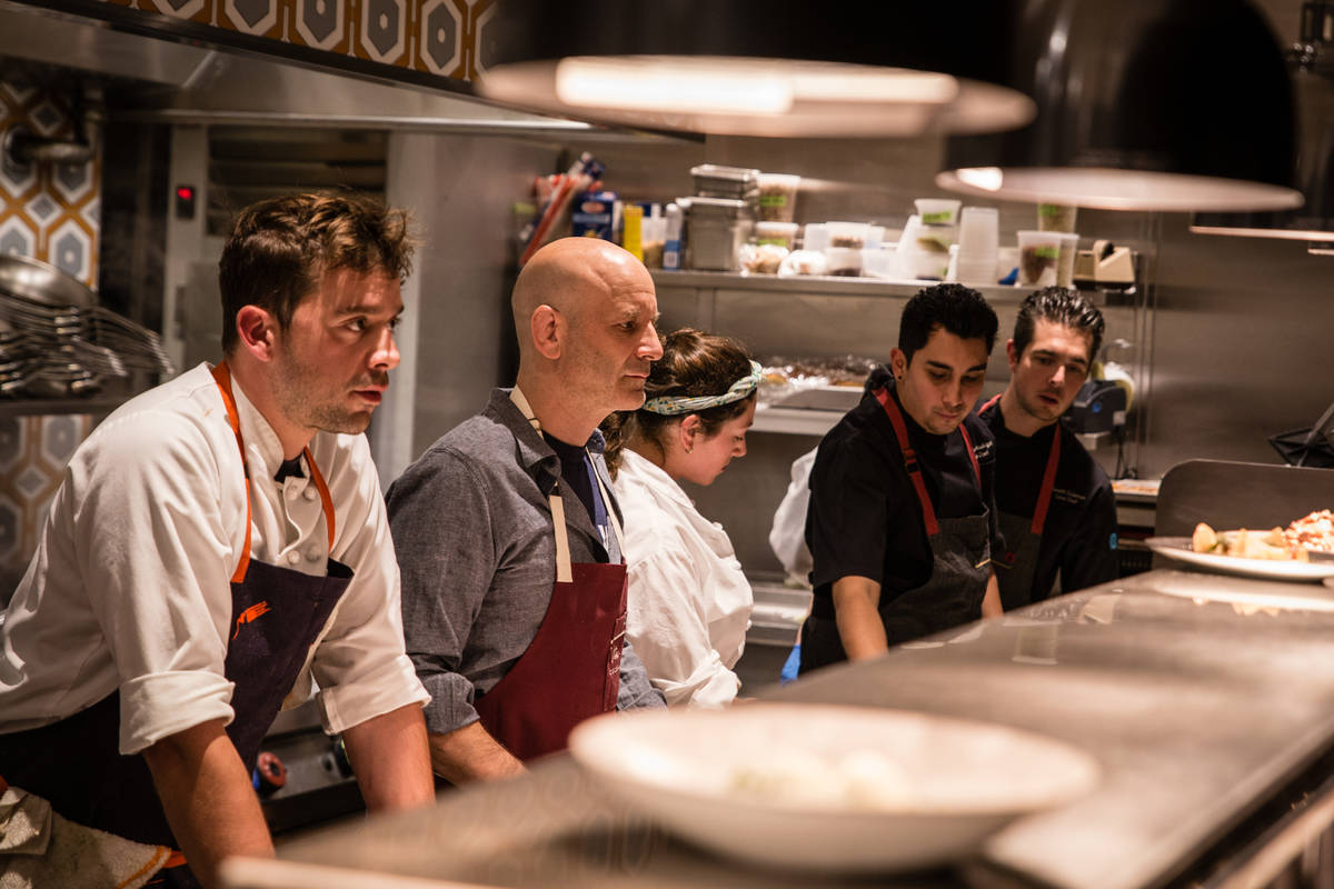 Osteria Fiorella Executive Chef Joel Myers, left, Marc Vetri, second from left, and their team, ...